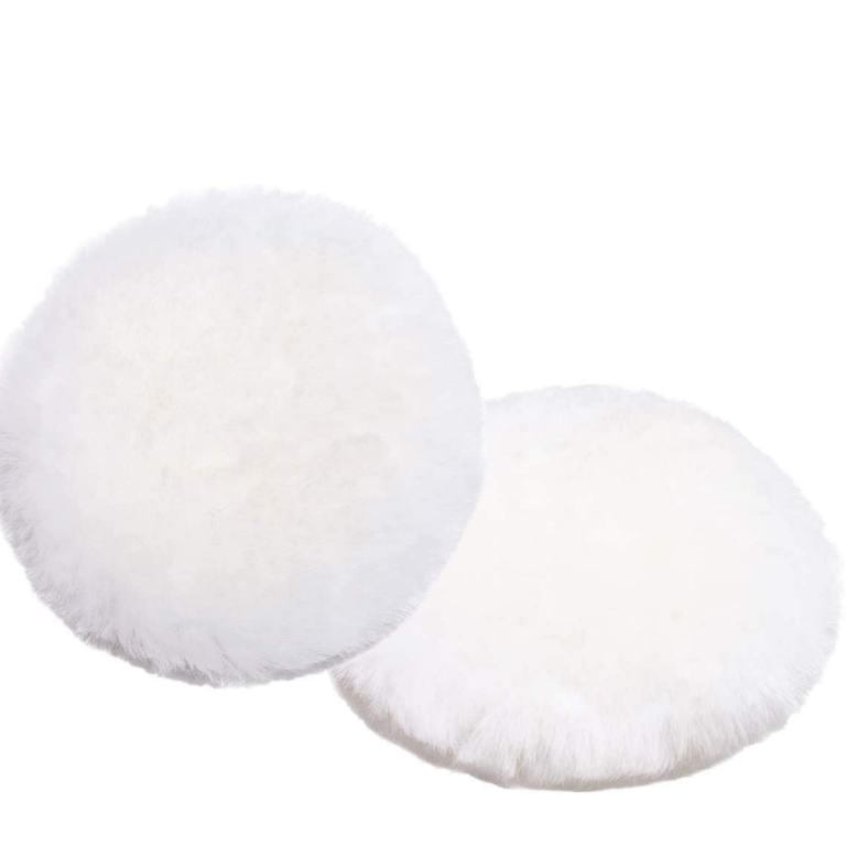 Two views of a white sheepskin buffing pad