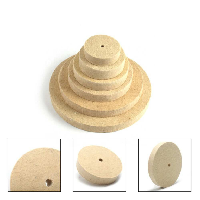 Assortment of beige solid felt polishing wheels in different sizes with center bores